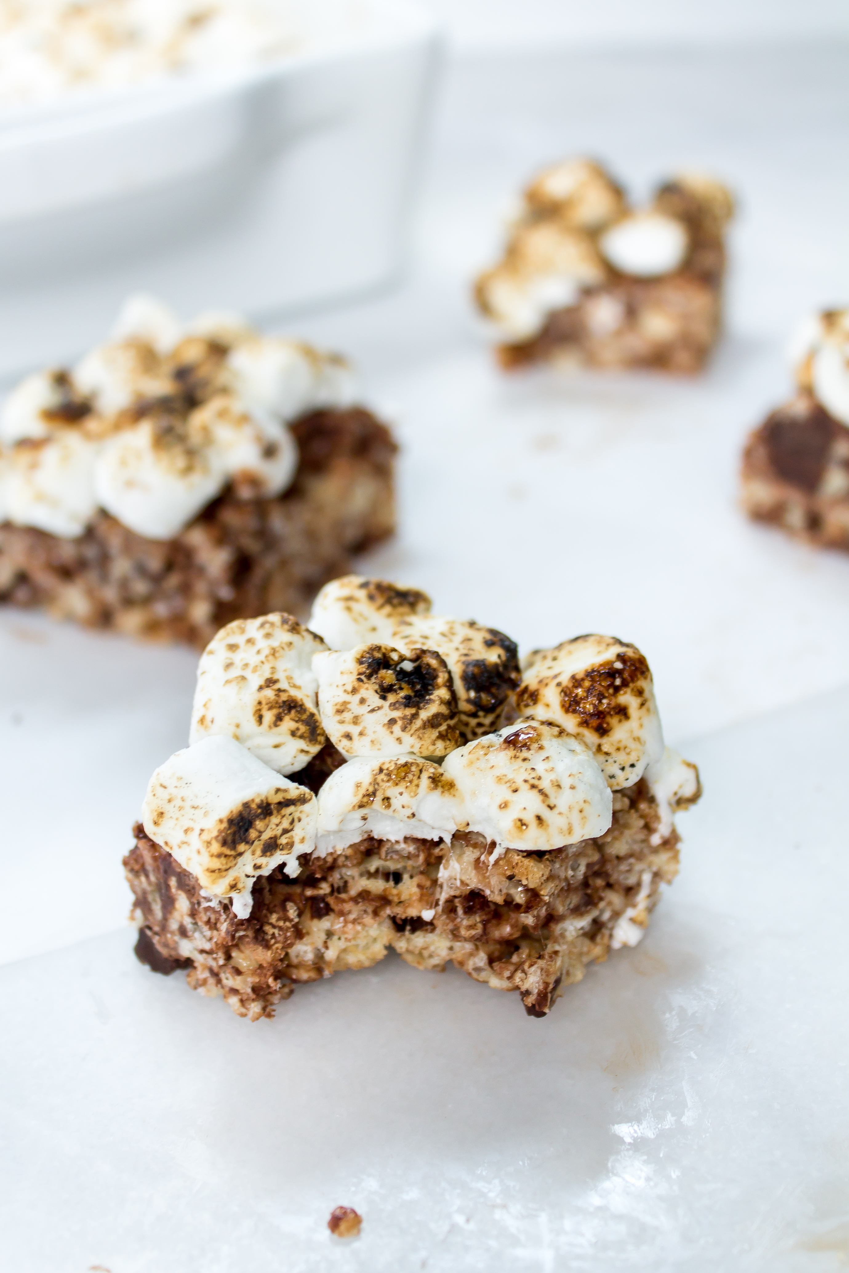 S'mores rice krispie treats are the easiest no-bake treat to make when you want that campfire s'mores taste without the hassle. | Pass the Cookies | www.passthecookies.com