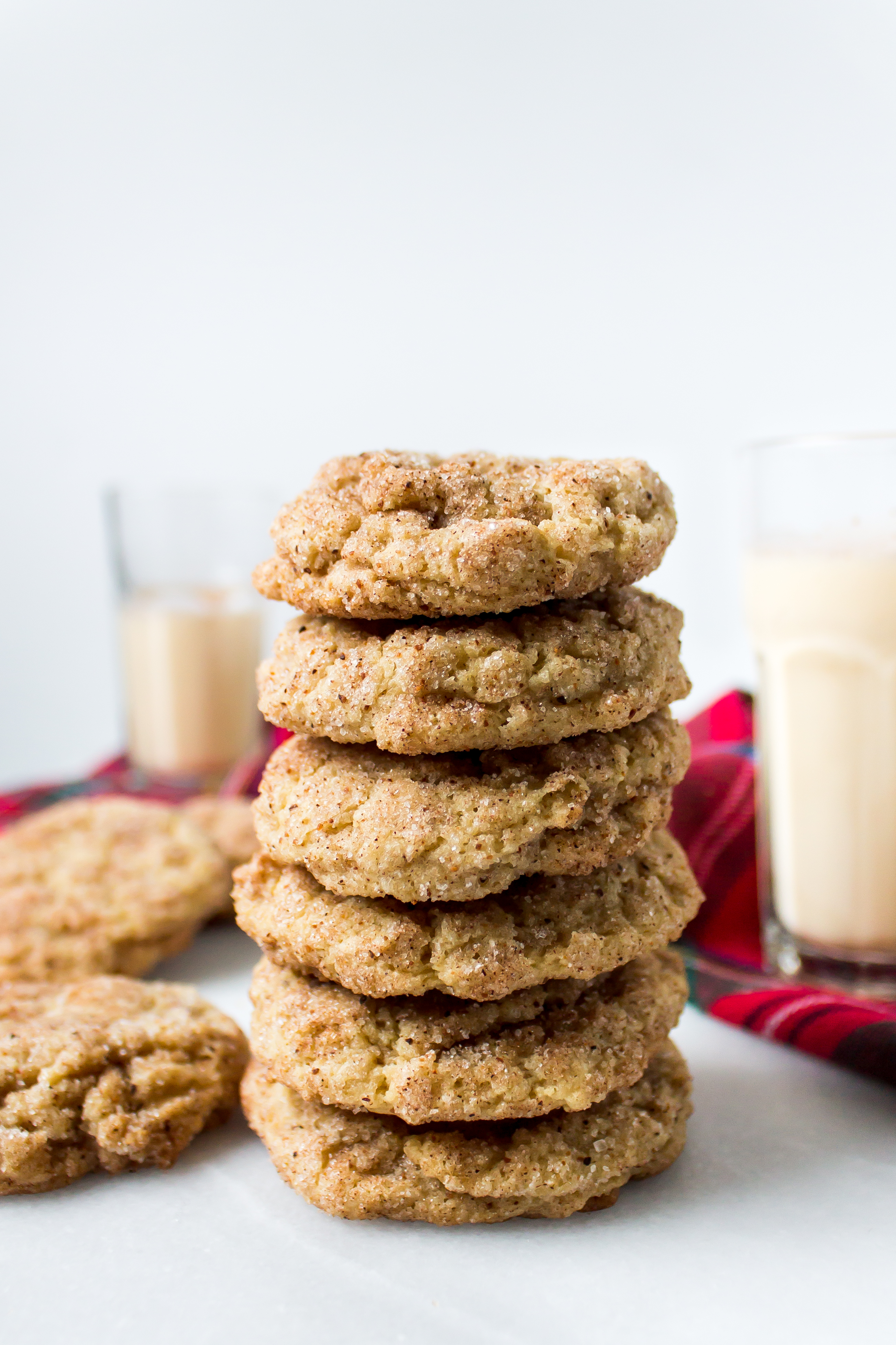 Eggnog snickerdoodles are soft, chewy, and filled with the familiar eggnog and nutmeg flavors. They are the perfect easy cookie to add to your plate of Christmas cookies this year! | Pass the Cookies | www.passthecookies.com
