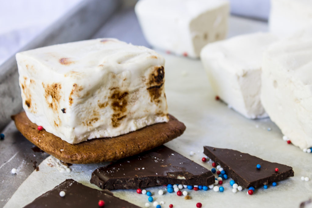 These delicious homemade honey graham cracker and whiskey marshmallow s'mores are perfect for your 4th of July cookout!