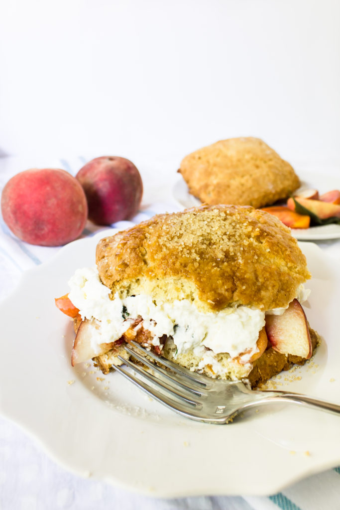 Brown sugar peach shortcake with basil whipped cream are the perfect fresh summer treat and a beautiful way to use up those sweet farmer's market peaches.