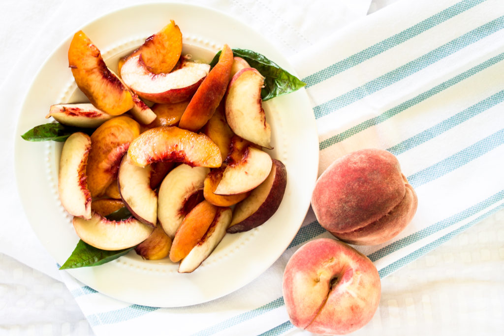 Brown sugar peach shortcake with basil whipped cream are the perfect fresh summer treat and a beautiful way to use up those sweet farmer's market peaches.