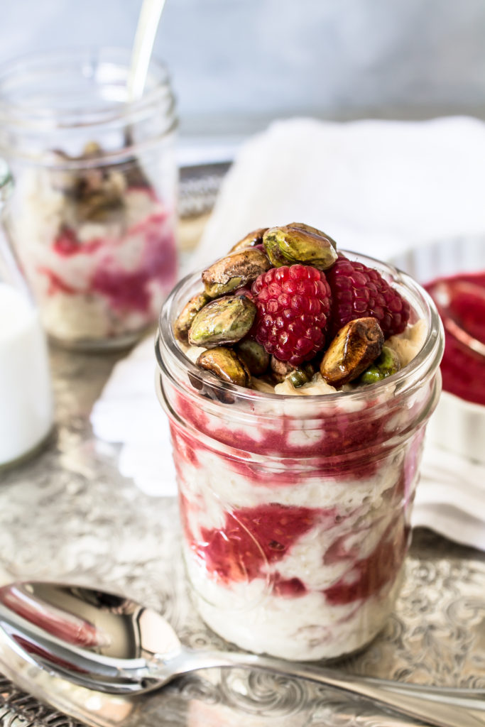 This creamy porridge with raspberry ripple and honey toasted pistachios is a delicious, nutritious way to start your morning.