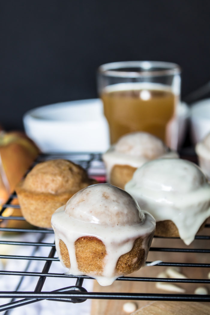 apple cider doughnut muffins with cinnamon sugar, maple whiskey glaze, and apple cider glaze