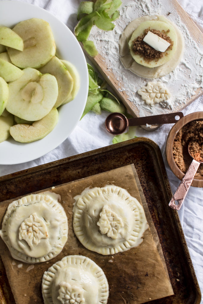 Happy Pi Day! Apple hand pies with bourbon sauce | www.passthecookies.com