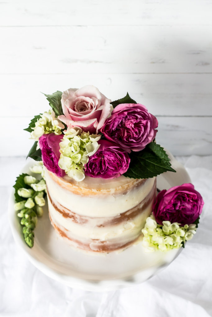 Celebration time with this beautiful champagne cake with rose buttercream! 