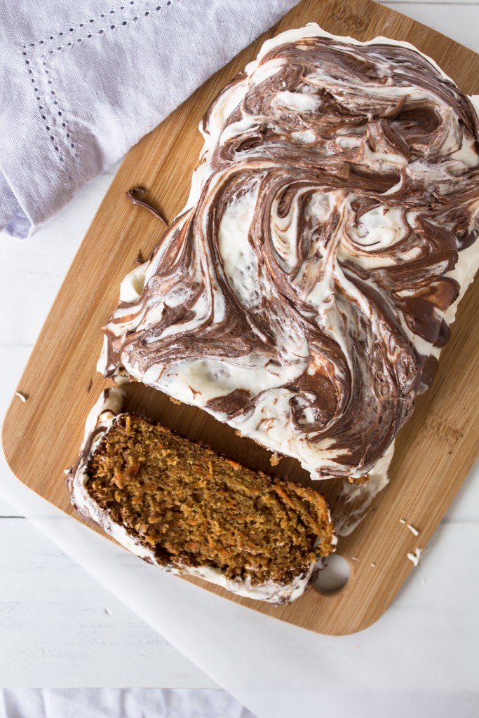 Carrot cake loaf with nutella swirled cream cheese frosting is the perfect breakfast, snack and dessert this Easter and this spring.  It's basically vegetable bread, right?