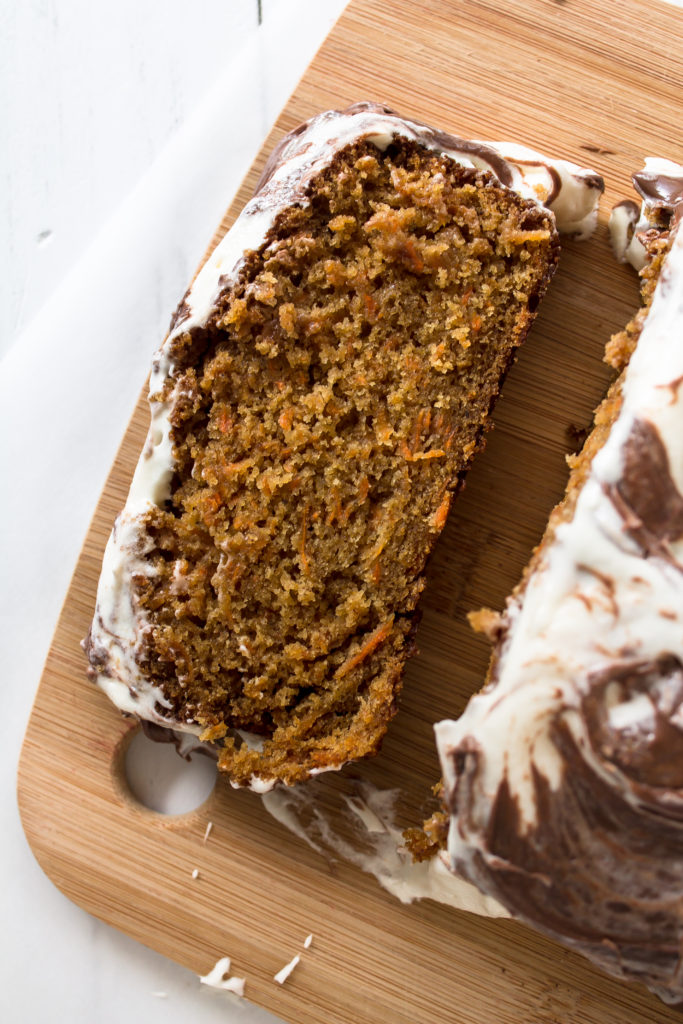 Carrot cake loaf with nutella swirled cream cheese frosting is the perfect breakfast, snack and dessert this Easter and this spring.  It's basically vegetable bread, right?