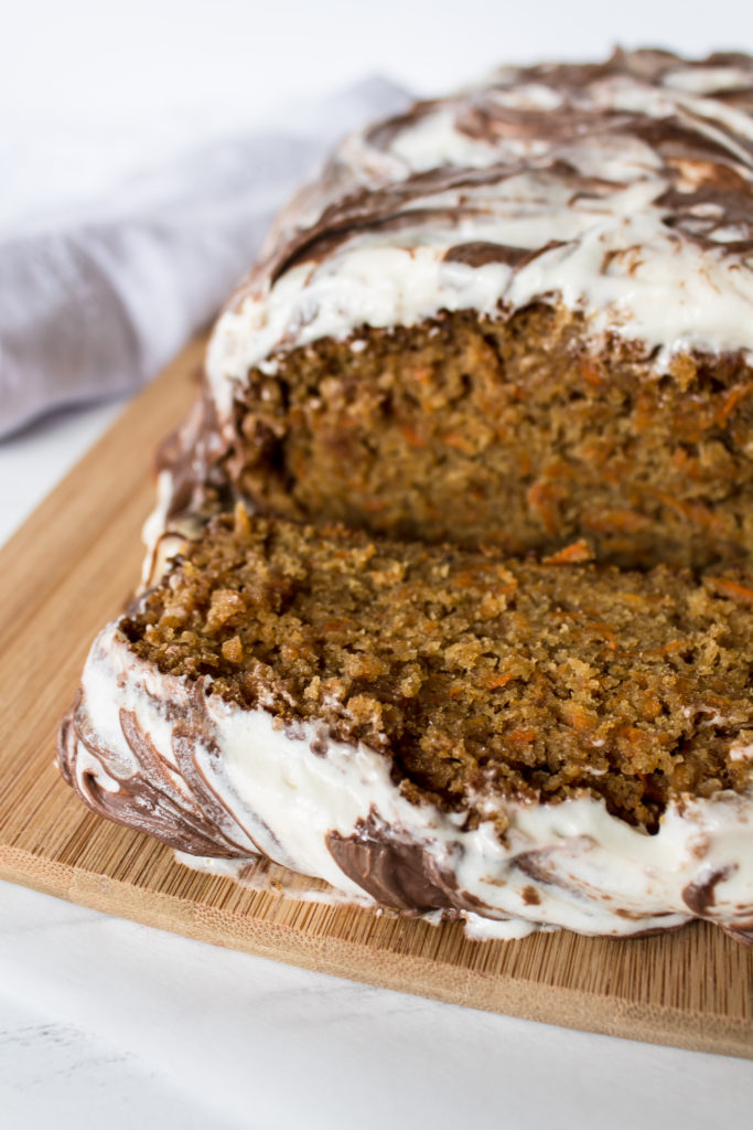 Carrot cake loaf with nutella swirled cream cheese frosting is the perfect breakfast, snack and dessert this Easter and this spring.  It's basically vegetable bread, right?