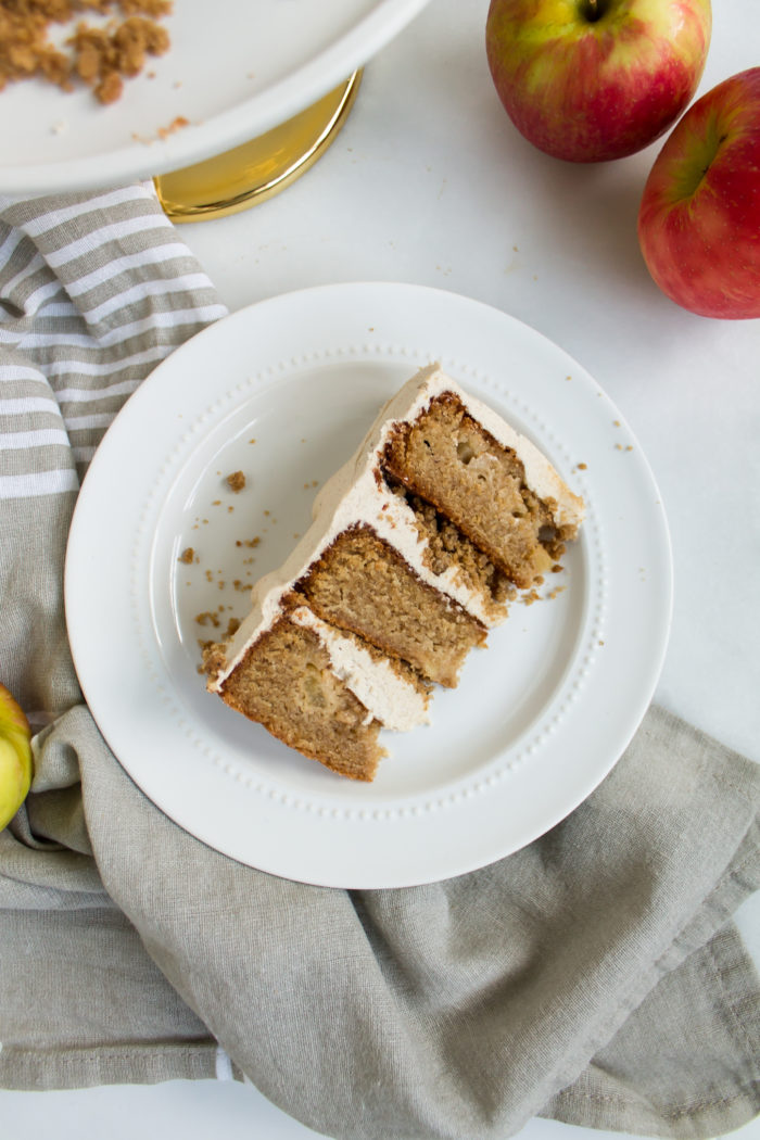 apple cake with apple cider soak, brown butter crumble, and cinnamon frosting