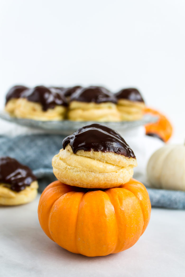 pumpkin cream puffs with chocolate glaze