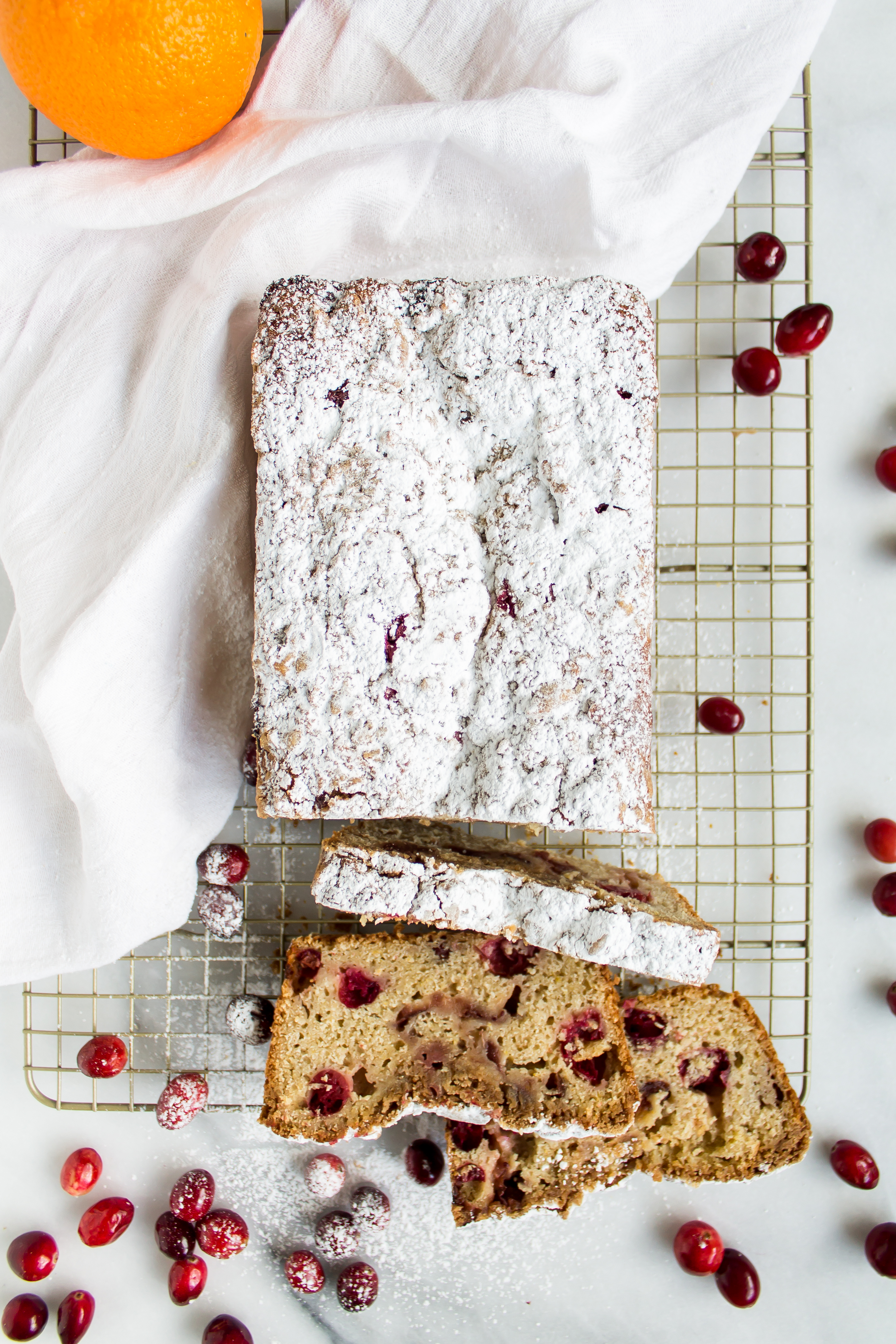 Cranberry quick bread is the perfect double duty bread! Make it for breakfast on Thanksgiving morning or use your leftover cranberry sauce to make a loaf for post-Thanksgiving enjoyment. | www.passthecookies.com
