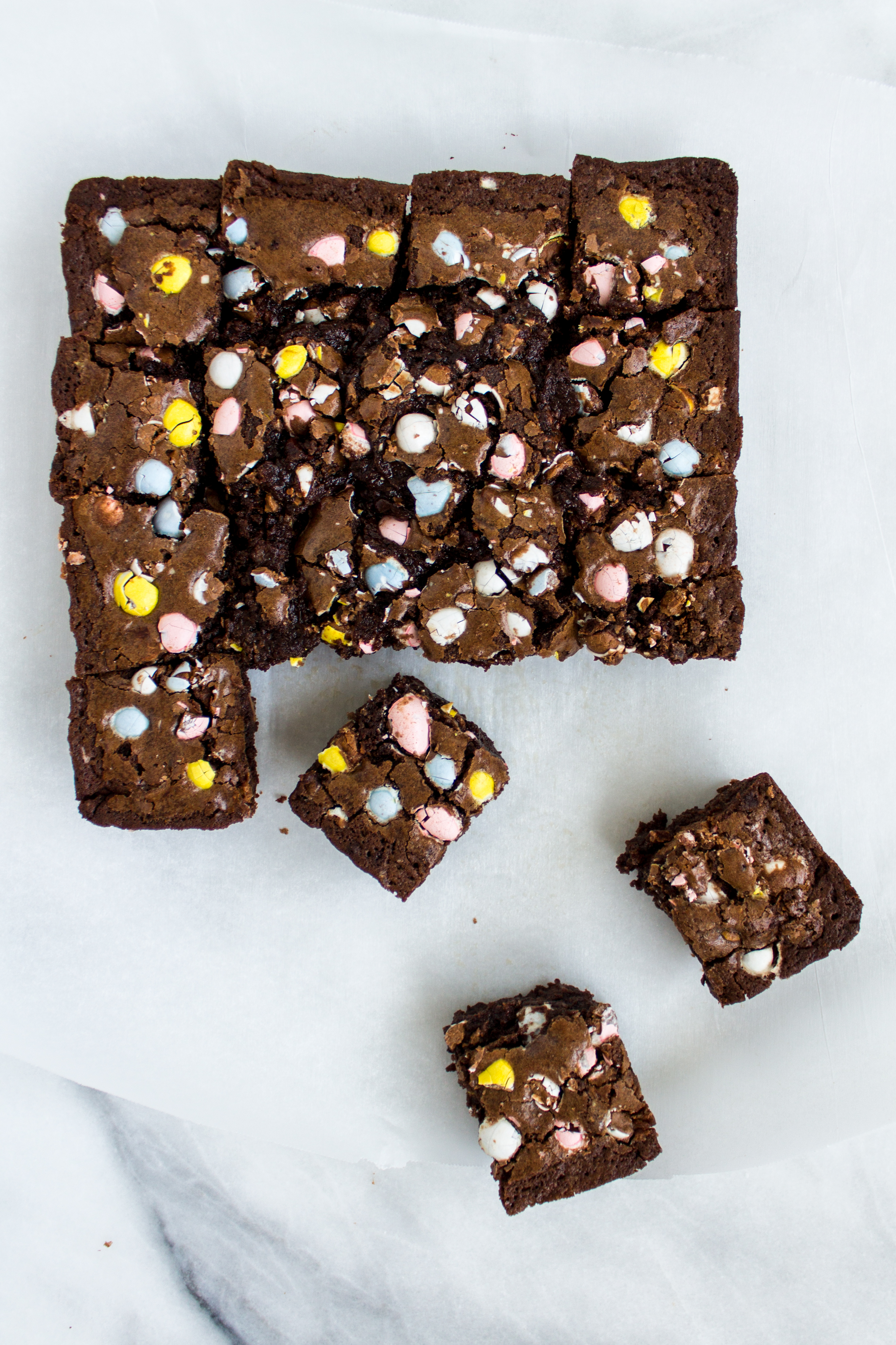 These fudgy, decadent Cadbury mini egg brownies are the perfect treat for Easter! They are easy to throw together, delicious, and good for snacking on even days later. | www.passthecookies.com