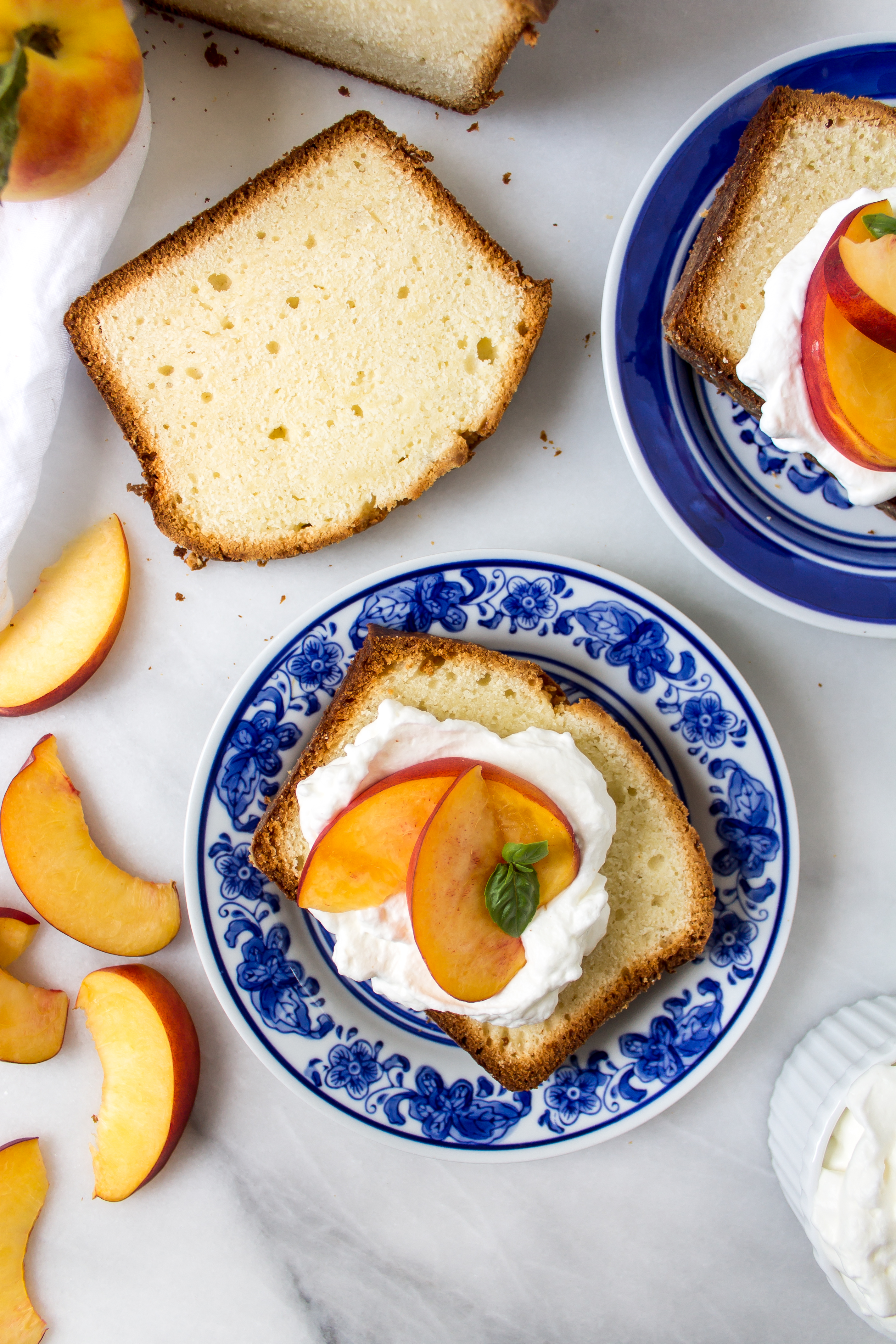 Greek yogurt almond pound cake is the perfectly simple dessert you need to showcase your delicious summer fruit. | www.passthecookies.com
