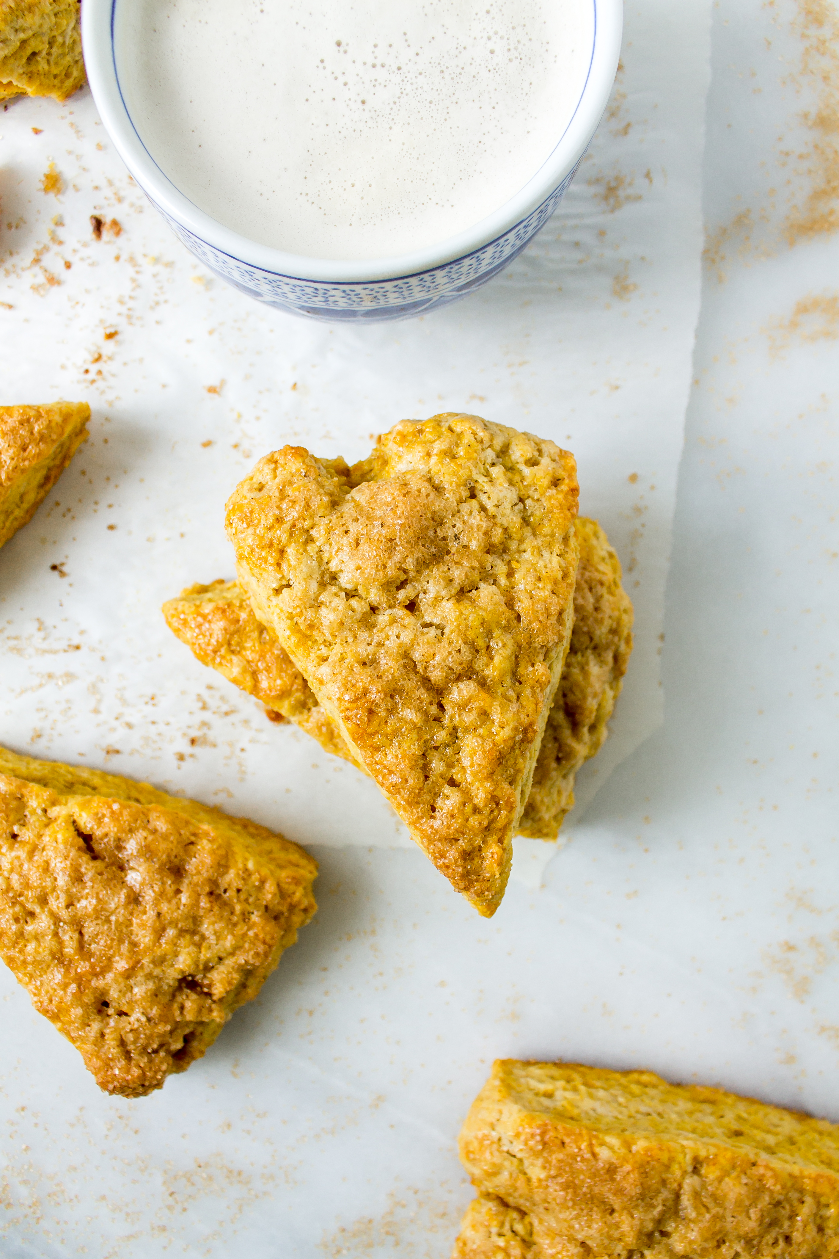 Fluffy, buttery pumpkin scones make the perfect pairing to your coffee on those crisp fall mornings. | Pass the Cookies | www.passthecookies.com